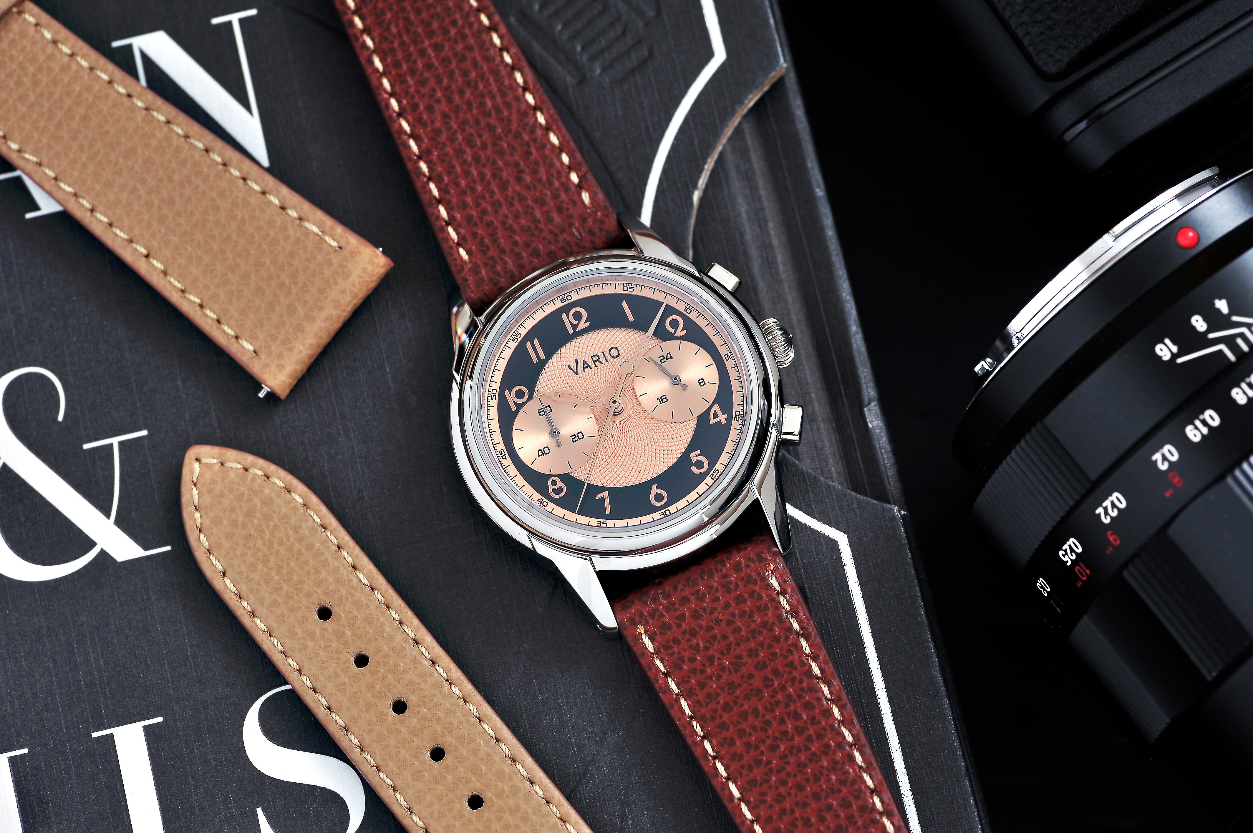 Inspired by sleek geometry, elegant typography and bold designs of the 1930s, Vario’s Empire Art Deco Dress Watch Collection is merging time with timelessness.  The 38mm Empire Art Deco Watch (Handwound) features all custom made parts, a Miyota 6T33 handwound movement with clean sweep hands, sapphire crystal and a luxurious Italian leather watch strap. 